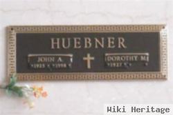 John A Huebner