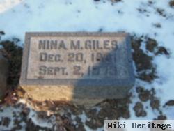 Nina M Giles