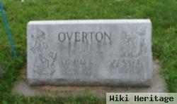 Charles E Overton