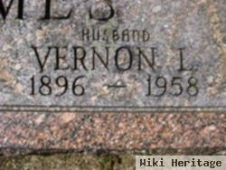 Vernon L Holmes