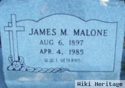 James M Malone