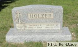 Thomas A Holzer