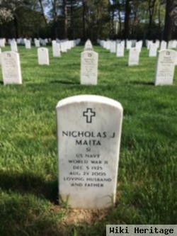 Nicholas J Maita