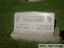 John P Milyak