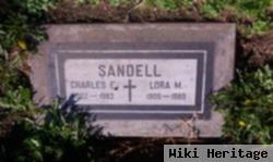 Lora M Sandell