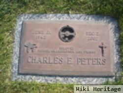 Charles E Peters