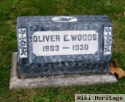 Oliver E Woods