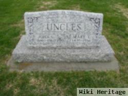 John G Uncles