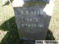 D. B. Adams