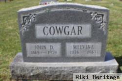 John D Cowger