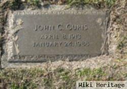 John C Guris