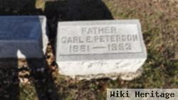 Carl E Peterson