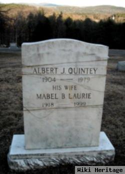 Albert J Quintey