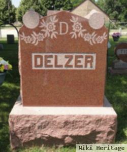 Albert M Delzer