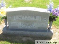 Carl L Miller