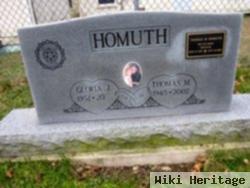 Thomas M Homuth