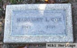 Margaret L Cox