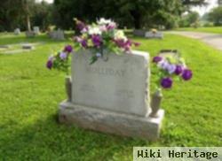 Laura M Brooks Holliday