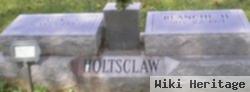 C V Holtsclaw