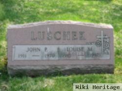 John P. Luschek