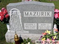 Joseph E Mazurik