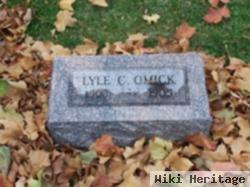 Lyle C Omick
