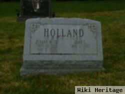 Jean C Holland