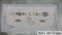 Herbert E Carlson