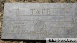 John T Tate