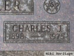 Charles J Miller