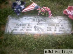 Robert E Helms