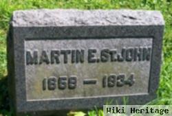 Martin E St. John