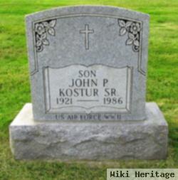 John P Kostur, Sr