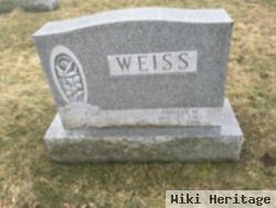 Carl E Weiss