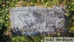 John M Hopkins