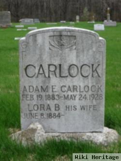 Adam E. Carlock