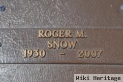 Roger M Snow