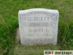 Albert G Schuett