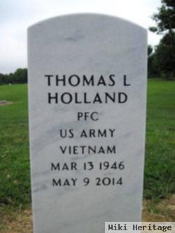 Thomas L Holland