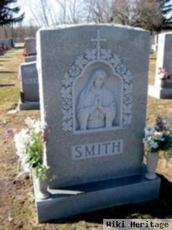 John F Smith