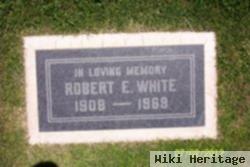 Robert E White