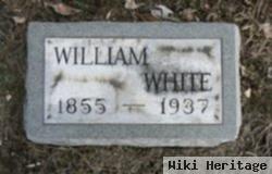 William J White