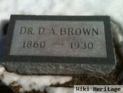 Dr Delbert Alansing Brown