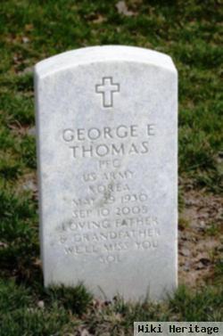 George E Thomas