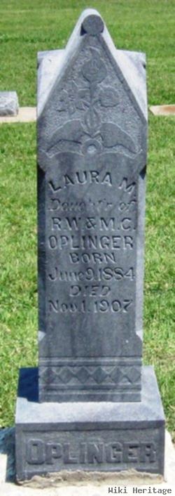 Laura M Oplinger