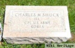 Charles M Shuck