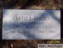 Curtis L. Holder