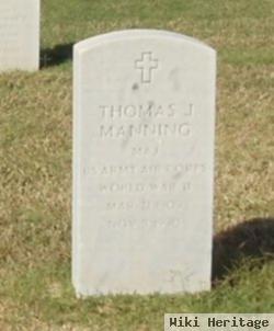 Thomas J Manning