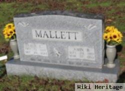 Nina L. Mallett