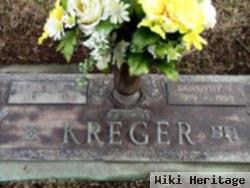 Roy J Kreger